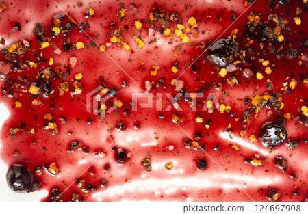 Black currant jam with chili, chilli pepper marmalade smear, spicy blueberry jelly 124697908
