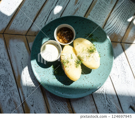 Lithuanian potato dumplings, cepelinai pancakes or kolduny, meat stuffed draniki, traditional didzkukuliai 124697945