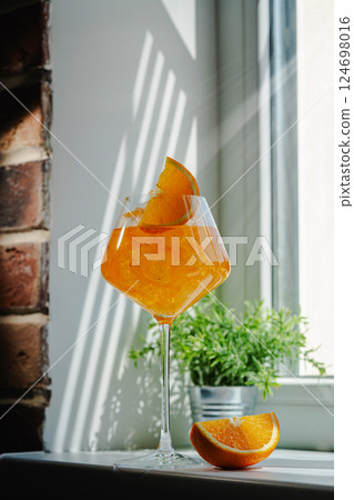 Glass of Aperol spritz cocktail Glass of Aperol spritz cocktail 124698016