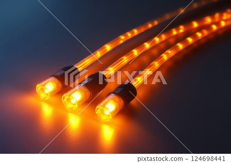 Glowing fiber optic cables with LED lights 124698441
