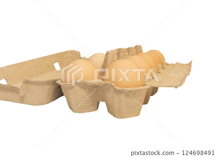 Light brown organic raw chicken eggs in package isolated on white background. 124698491