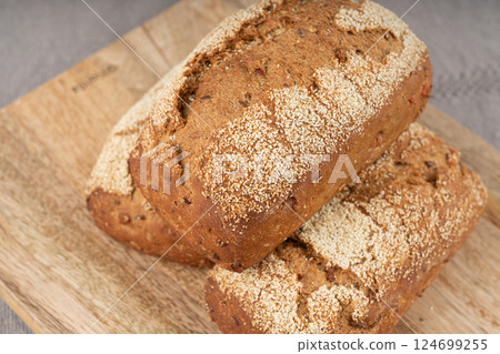 Whole wheat brown bread, fitness pumpkin carrot buns with seeds, cereal bread grain bun 124699255