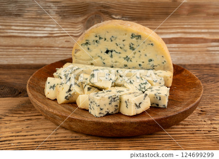 Fourme cheese, stinky french cheese, Fourme d'Ambert gourmet food, semi-hard blue cheese Fourme cheese, stinky french cheese, Fourme d'Ambert gourmet food, semi-hard blue cheese 124699299