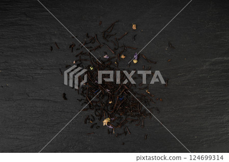 Flavored Black Tea Leaves Pile Texture, High Quality Black Tea Pile with Fruits and Flowers, Dry Tea Leaves Flavored Black Tea Leaves Pile Texture, High Quality Black Tea Pile with Fruits and Flowers, Dry Tea Leaves 124699314