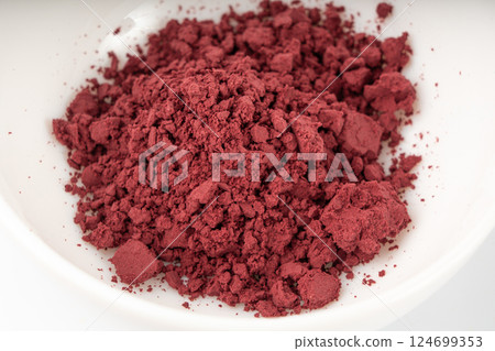 Acai powder circle pile, violet superfood dust, pink fruit flour extract mound 124699353