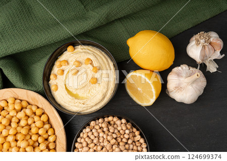 Hummus in bowl, houmous dip, chickpea humus tahini sauce, middle eastern spread 124699374