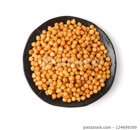 Small pastry balls, fried crispy wheat soup pearls, salad egg puffs or choux pastry 124699389