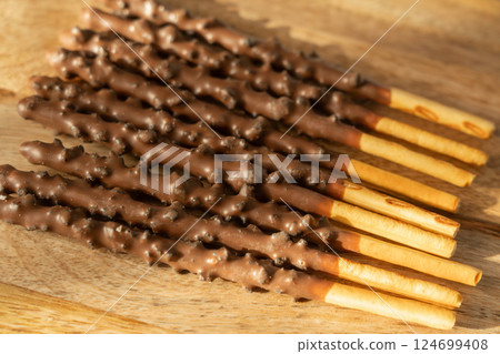 Chocolate cookie sticks, long choco pastries, japan biscuit tubes, korea cracker sticks 124699408