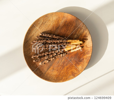 Chocolate cookie sticks, long choco pastries, japan biscuit tubes, korea cracker sticks 124699409