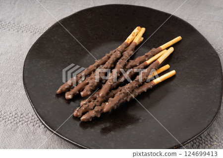 Chocolate cookie sticks, long choco pastries, japan biscuit tubes, korea cracker sticks 124699413