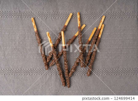 Chocolate cookie sticks, long choco pastries, japan biscuit tubes, korea cracker sticks 124699414