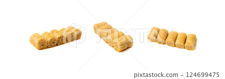Rolled Baklava Isolated, Ramadan Dessert Roll on Restaurant Plate, Eastern Sweet Pastries Rolled Baklava Isolated, Ramadan Dessert Roll on Restaurant Plate, Eastern Sweet Pastries 124699475