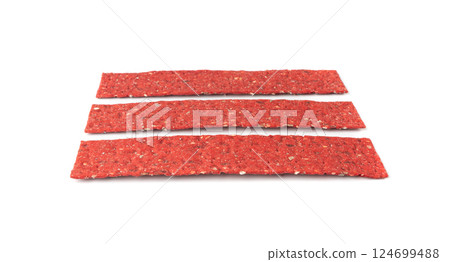 Beetroot crackers, thin rusk beet root bread, red diet multigrain crispbread, various seeds 124699488