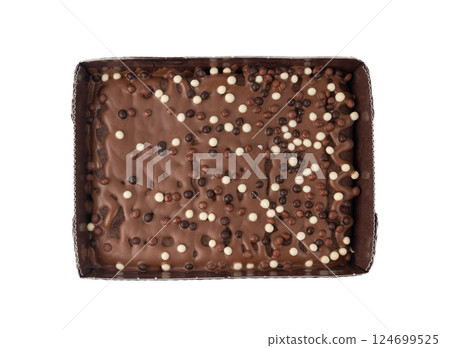 Chocolate brownie cake sprinkled with white and dark balls, classic birthday brownie square piece 124699525