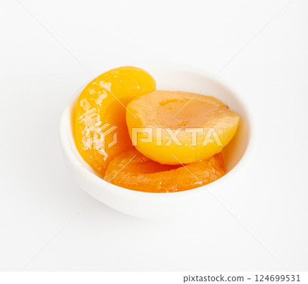 Canned Peaches, Apricot Halves in Syrup, Yellow Fruit Dessert, Tinned Nectarine Compote 124699531