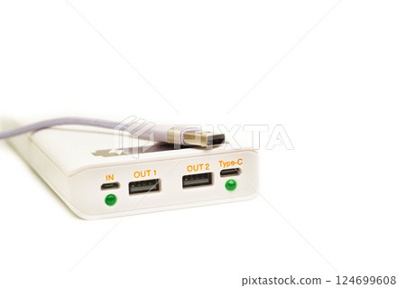 White power bank, usb cable for charging various gadgets, phones White power bank, usb cable for charging various gadgets, phones 124699608