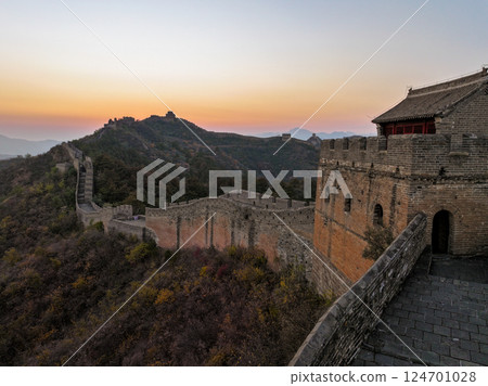 Great wall of China at sunset with rolling hills at dusk Great wall of China at sunset with rolling hills at dusk 124701028