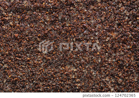 Close up of coarse ground coffee beans texture with rich brown color Close up of coarse ground coffee beans texture with rich brown color 124702365