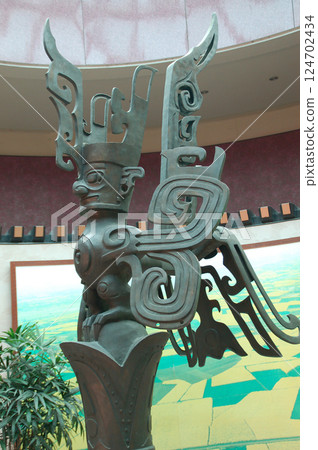 China, Sichuan Province, Yangtze River Civilization, Sanxingdui Ruins Museum, 2nd Hall, Human face and bird statue, right side 124702434