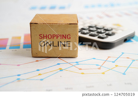 Online shopping, Shopping cart box on calculator, import export, finance commerce. 124705019