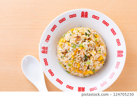 Eating fried rice at a Chinese restaurant 124705230