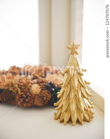 Christmas decorations on the windowsill Christmas decorations on the windowsill 124707076