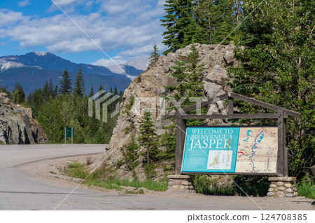 Jasper, Alberta, Canada - June 25 2021 : Welcome to Jasper Town Sign Amidst Scenic Canadian Rockies 124708385