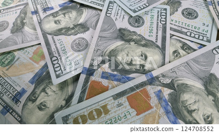 An Intriguing CloseUp View of U.S. Dollar Bills Stacked Neatly Together in a Pile An Intriguing CloseUp View of U.S. Dollar Bills Stacked Neatly Together in a Pile 124708552