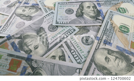 Tall stacks of American Hundred Dollar Bills accumulating over time, symbolizing wealth and value Tall stacks of American Hundred Dollar Bills accumulating over time, symbolizing wealth and value 124708602