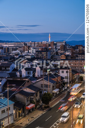 Evening view of Kyoto city with the illuminated Kyoto Tower Evening view of Kyoto city with the illuminated Kyoto Tower 124708606