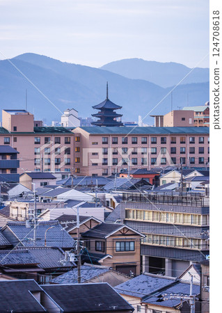 Evening view of Kyoto city with mountain ranges and the five-story pagoda of Toji Temple Evening view of Kyoto city with mountain ranges and the five-story pagoda of Toji Temple 124708618