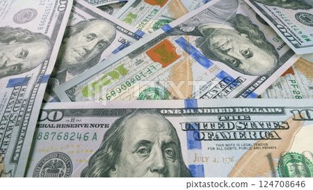 A closeup view of neatly stacked U.S. Dollar Bills, highlighting their financial significance 124708646