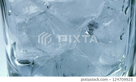 A Refreshing Glass of Ice Cold Water Perfect for Quenching Your Thirst on a Hot Day 124709928