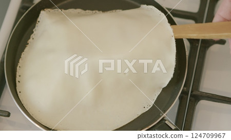 Cooking Delicious Crepes on a NonStick Pan for Your Breakfast, Brunch, or Snack Time Cooking Delicious Crepes on a NonStick Pan for Your Breakfast, Brunch, or Snack Time 124709967