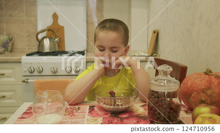 A delightful moment during breakfast in a cozy and warm kitchen filled with comfort and joy 124710956