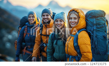 Adventurous hiking group in vibrant outdoor attire exploring scenic mountain landscape 124713173