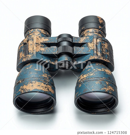 Vintage camouflage binoculars with textured paint for outdoor adventures and wildlife observation 124715308
