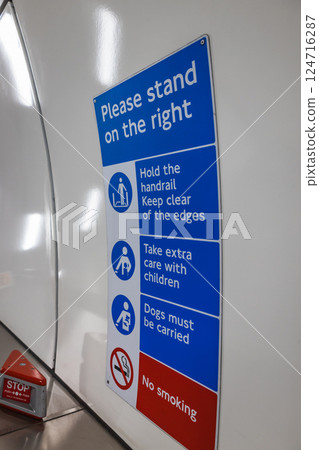 Please stand on the right safety instructions sign in London Tube station 124716287