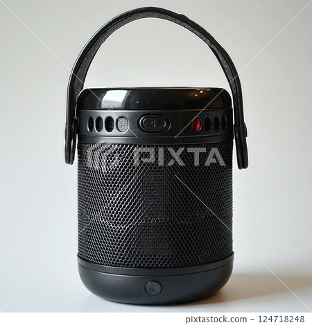 Portable bluetooth speaker with strap for outdoor use in sleek black design Portable bluetooth speaker with strap for outdoor use in sleek black design 124718248