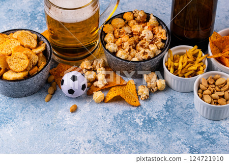 Beer and different snacks for Superbowl or football party Beer and different snacks for Superbowl or football party 124721910