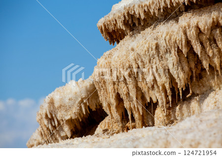 Natural salt stalactites crystals at the Dead Sea Natural salt stalactites crystals at the Dead Sea 124721954