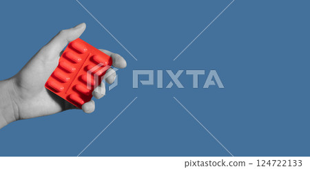 Medicine for health treatment. Woman holding antidepressant capsule, prescription drug, or 124722133