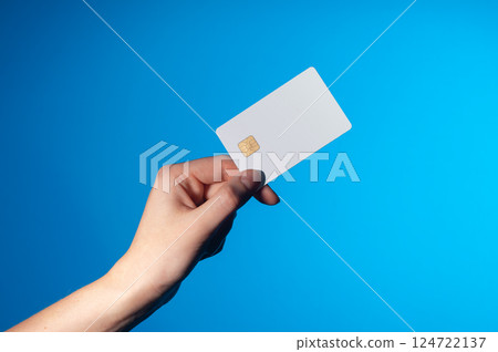 Card for payment and finance. Woman holding plastic credit or debit card for business, commerce, 124722137