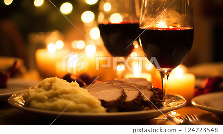 Romantic dinner for two featuring roasted pork tenderloin and wine 124723548