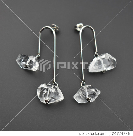 Unique earrings for women on a black background, promotional photo for an online vintage and handmade jewelry store Unique earrings for women on a black background, promotional photo for an online vintage and handmade jewelry store 124724786