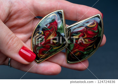 Unique earrings for women on a black background, promotional photo for an online vintage and handmade jewelry store Unique earrings for women on a black background, promotional photo for an online vintage and handmade jewelry store 124724836