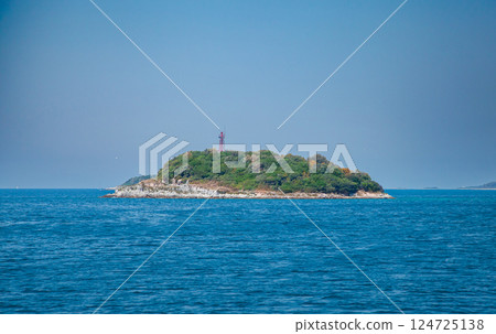Rovinj, Croatia. Remote island with small lighthouse Adriatic Sea. Maritime navigation concept 124725138