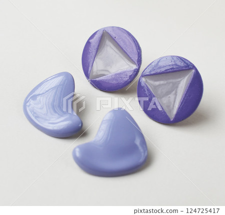 Unique earrings for women on a white background, promotional photo for an online vintage and handmade jewelry store 124725417