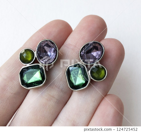 Unique earrings for women on a white background, promotional photo for an online vintage and handmade jewelry store 124725452