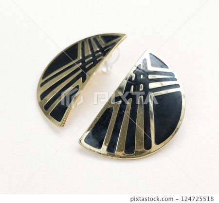 Unique earrings for women on a white background, promotional photo for an online vintage and handmade jewelry store Unique earrings for women on a white background, promotional photo for an online vintage and handmade jewelry store 124725518
